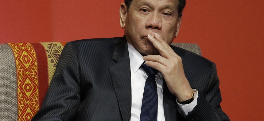 Philippines' President Rodrigo Duterte attends a meeting between business leaders and heads of states of the Asia Pacific Economic Cooperation, APEC, during their annual forum in Lima, Peru, Saturday, Nov. 19, 2016.
