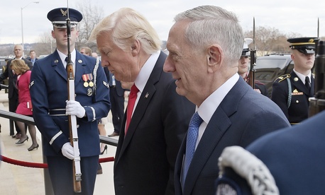 U.S. Defense Secretary Jim Mattis, right, and U.S. President Donald Trump walk into the Pentagon in Washington, Jan. 27, 2017. U.S. Defense Secretary Jim Mattis, right, and U.S. President Donald Trump walk into the Pentagon in Washington, Jan. 27, 2017.