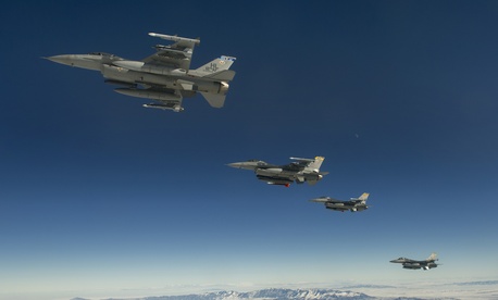 A formation of F-16 Fighting Falcons from the 421st Fighter Squadron, Hill Air Force Base, Utah, depart the snow-laden state en route to San Diego, Calif., Jan. 18, 2013. A formation of F-16 Fighting Falcons from the 421st Fighter Squadron, Hill Air Force Base, Utah, depart the snow-laden state en route to San Diego, Calif., Jan. 18, 2013.