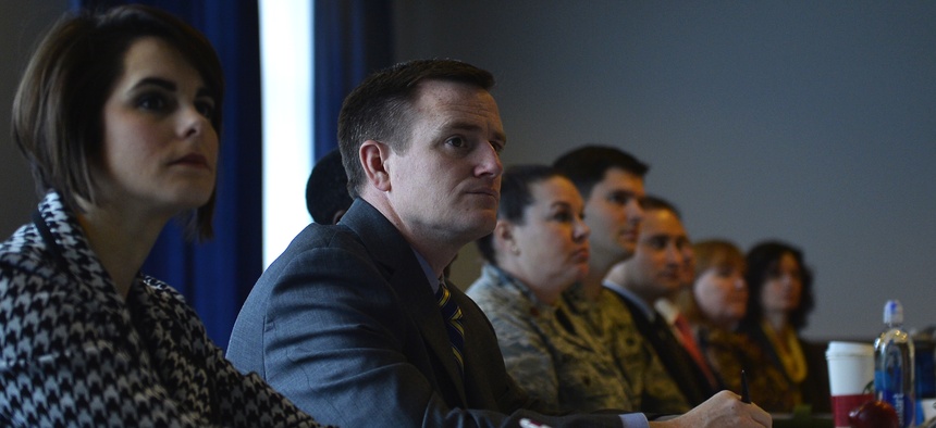 Military and civilian defense contracting representatives attend a meeting at Ramstein Air Base, Germany, Jan. 24, 2017.
