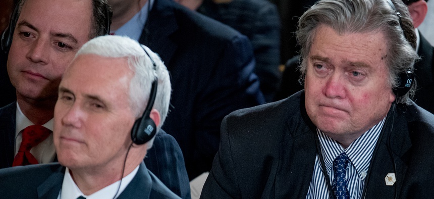From left, White House Chief of Staff Reince Priebus, Vice President Mike Pence, and Senior Adviser Steve Bannon attend a joint White House news conference with President Donald Trump and German Chancellor Angela Merkel on March 17, 2017.