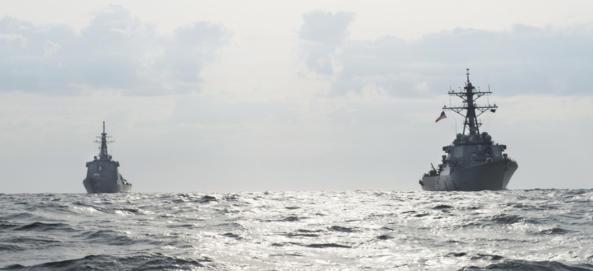 The Arleigh Burke-class guided-missile destroyer USS Fitzgerald (DDG 62) conducts a bilateral training exercise with the Japanese Maritime Self-Defense Force Kongou class guided-missile destroyer JS Choukai (DDG 176), April 25, 2017.