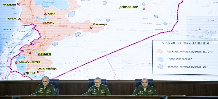 From left, Col. Gen. Sergei Rudskoi of the Russian General Staff, Deputy Defense Minister Alexander Fomin and Lt. Gen. Stanislav Gadzhimagomedov attend a briefing in the Defense Ministry in Moscow, Russia, Friday, May 5, 2017.