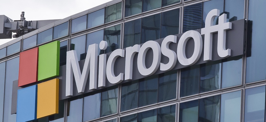 This April 12, 2016 file photo shows the Microsoft logo in Issy-les-Moulineaux, outside Paris, France. The cyberextortion attack hitting dozens of countries was a “perfect storm” of sorts.