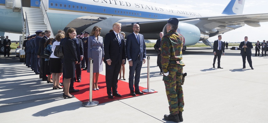 President Donald Trump and First Lady Melania Trump are welcomed by Belgium Prime Minister Charles Michel, and his wife, Amélie Derbaudrenghien, on their arrival to Brussels International Airport in Brussels, Belgium.