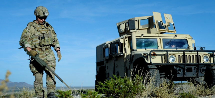 Tech Sgt. Nathaniel Jackson, 99th Civil Engineer Squadron explosive ordnance disposal technician, begins a roadside bomb clearing operation during a training event June 7, 2017 at the Nevada Test and Training Range.