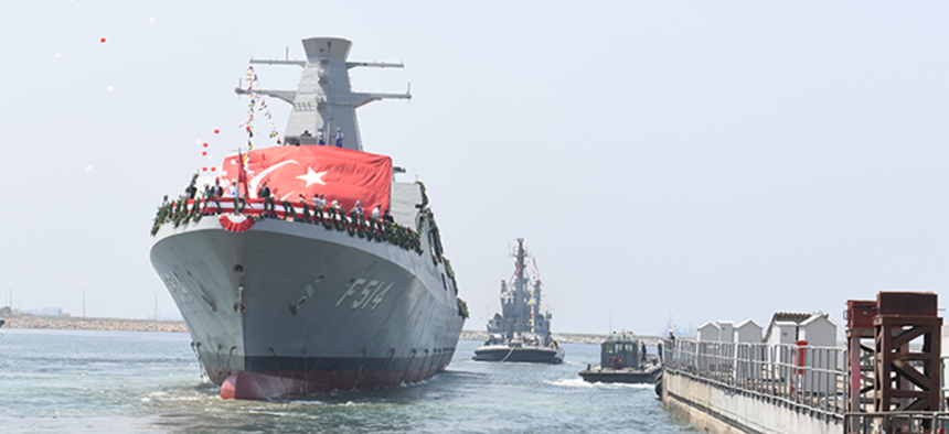 TCG Kinaliada, an Ada-class corvette, slides down the ways at Turkey's Tuzla Naval Shipyard on July 3, 2017