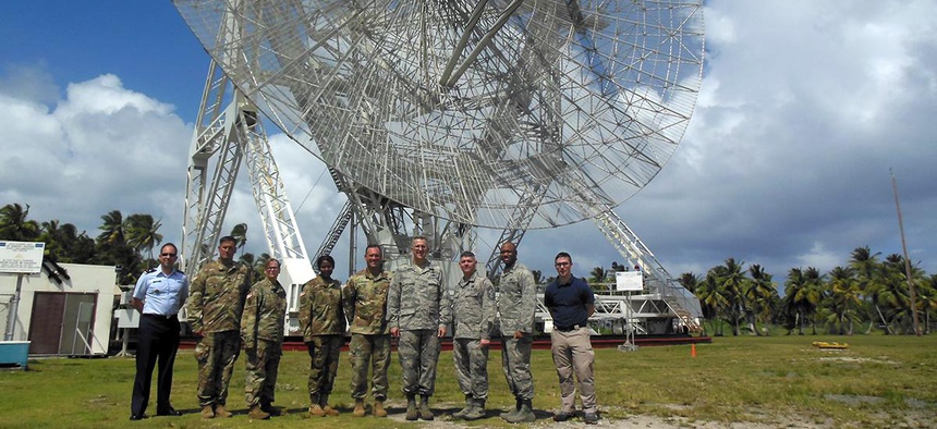 United States Strategic Command commander Air Force Gen. John Hyten, fourth from right, visits SMDC's Reagan Test Site on Kwaj.