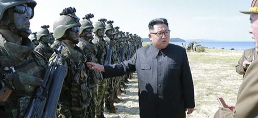 This image made from video aired by North Korea's KRT on Saturday, Aug. 26, 2017 shows a photo of North Korean leader Kim Jong Un inspecting soldiers during what Korean Central News Agency called a "target=striking contest" in North Korea.