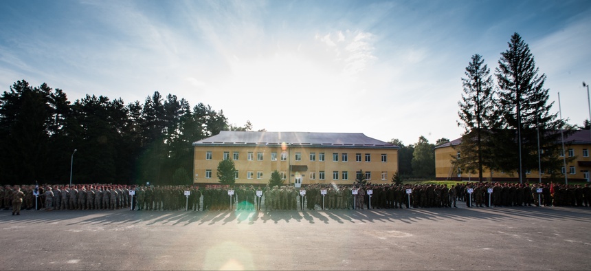 Soldiers from multiple nations stand in formation during Exercise Rapid Trident’s opening ceremony in Yavoriv, Ukraine, Sept. 15.