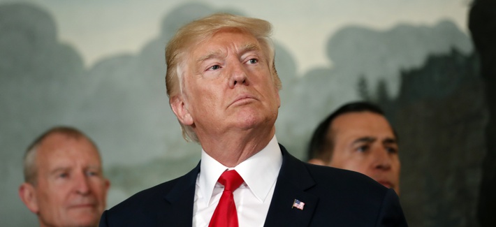 President Donald Trump pauses to answer a question after an event to sign a memorandum calling for a trade investigation of China, Aug. 14, 2017.