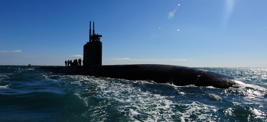 he Los Angeles-class attack submarine USS Scranton (SSN 756) pulls into Augusta Bay, Sicily, to receive supplies and personnel.