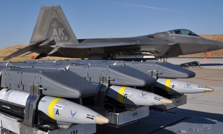 GBU-39 Small Diameter Bombs, made by Boeing, await loading on an F-22 Raptor in this 2012 file photo. 