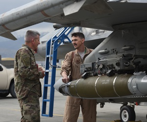U.S. Army Gen. John Nicholson, commander of Resolute Support Mission and U.S. Forces Afghanistan, speaks with U.S. Air Force Maj. Greg Balzhiser, a F-16 Fighting Falcon pilot, at Bagram Airfield, Afghanistan, May 13, 2017. U.S. Army Gen. John Nicholson, commander of Resolute Support Mission and U.S. Forces Afghanistan, speaks with U.S. Air Force Maj. Greg Balzhiser, a F-16 Fighting Falcon pilot, at Bagram Airfield, Afghanistan, May 13, 2017.