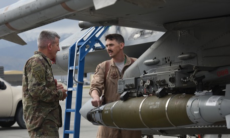 U.S. Army Gen. John Nicholson, commander of Resolute Support Mission and U.S. Forces Afghanistan, speaks with U.S. Air Force Maj. Greg Balzhiser, a F-16 Fighting Falcon pilot, at Bagram Airfield, Afghanistan, May 13, 2017. U.S. Army Gen. John Nicholson, commander of Resolute Support Mission and U.S. Forces Afghanistan, speaks with U.S. Air Force Maj. Greg Balzhiser, a F-16 Fighting Falcon pilot, at Bagram Airfield, Afghanistan, May 13, 2017.