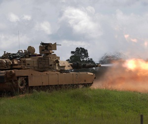 A tank crew, assigned to 1st Armored Brigade Combat Team, 3rd Infantry Division, fires at a target during qualifications exercises at Fort Stewart, Ga., Aug. 8, 2017. A tank crew, assigned to 1st Armored Brigade Combat Team, 3rd Infantry Division, fires at a target during qualifications exercises at Fort Stewart, Ga., Aug. 8, 2017.