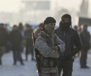 Armed Syrian fighters evacuated from the embattled Syrian city of Aleppo during the ceasefire arrive at a refugee camp in Rashidin, near Idlib, Syria, Tuesday, Dec. 20, 2016. Armed Syrian fighters evacuated from the embattled Syrian city of Aleppo during the ceasefire arrive at a refugee camp in Rashidin, near Idlib, Syria, Tuesday, Dec. 20, 2016.
