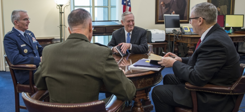 Defense Secretary James Mattis meets with other senior military and defense leaders earlier this year.