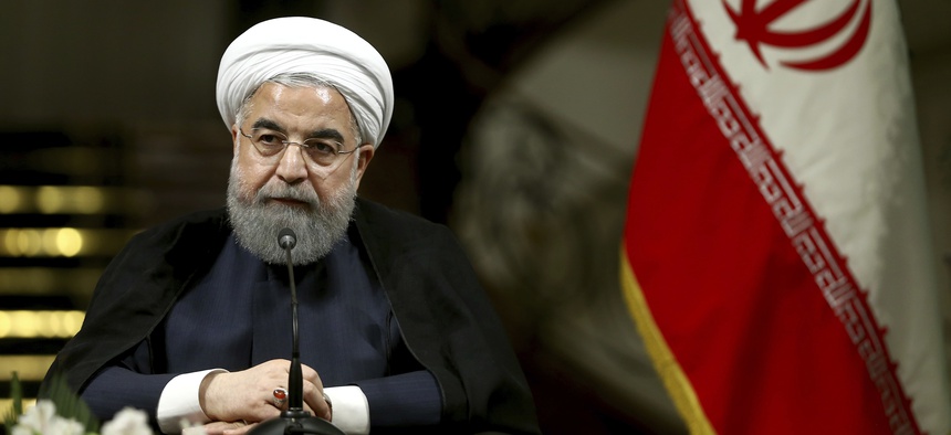Iranian President Hassan Rouhani speaks with media at the Saadabad Palace in Tehran, Iran, on Oct. 4, 2017