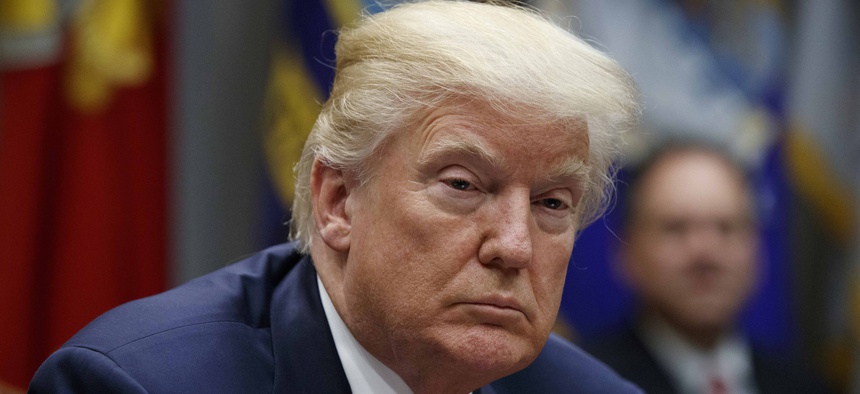 President Donald Trump listens during a meeting on tax policy with business leaders in the Roosevelt Room of the White House, Oct. 31, 2017, in Washington.
