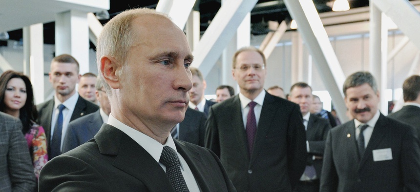 Russian Prime Minister Vladimir Putin visits a science and technology exhibit in Novosibirsk, about 2800 kilometers (1,750 miles) east of Moscow, Russia, Friday, Feb. 17, 2012.