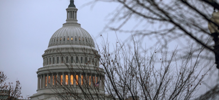 The Capitol is seen in Washington, early Tuesday, Dec. 5, 2017, days before a budget clash could produce a partial government shutdown by the weekend unless there's an agreement on a measure temporarily keeping agencies open.