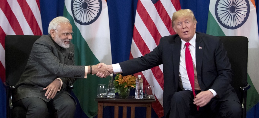 President Donald Trump, right, and Indian Prime Minister Narendra Modi shake hands during a bilateral meeting at the ASEAN Summit at the Sofitel Philippine Plaza, Monday, Nov. 13, 2017, in Manila, Philippines