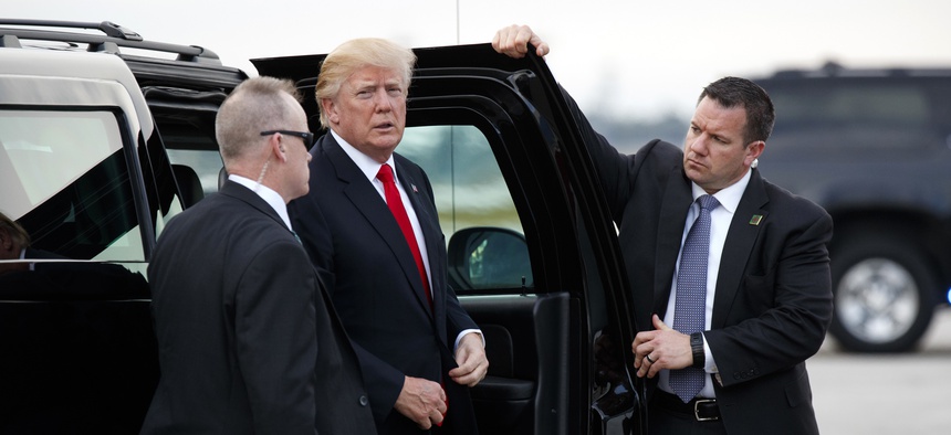 President Donald Trump arrives to board Air Force One at Palm Beach International Airport, Monday, Jan. 1, 2018, in West Palm Beach, Fla.
