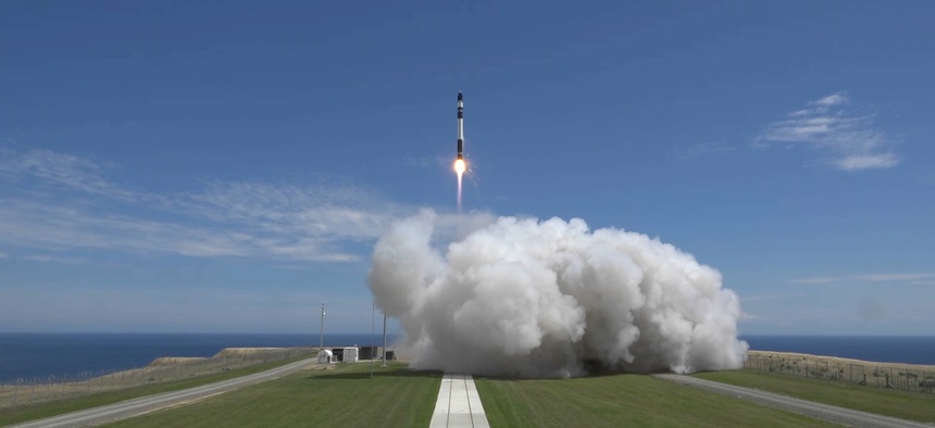 A Rocket Lab Electron booster lifts off from the company's Māhia Peninsula launch site in New Zealand on Jan. 21, 2018. The Electron rocket carried three small satellites into orbit for Rocket Lab customers.