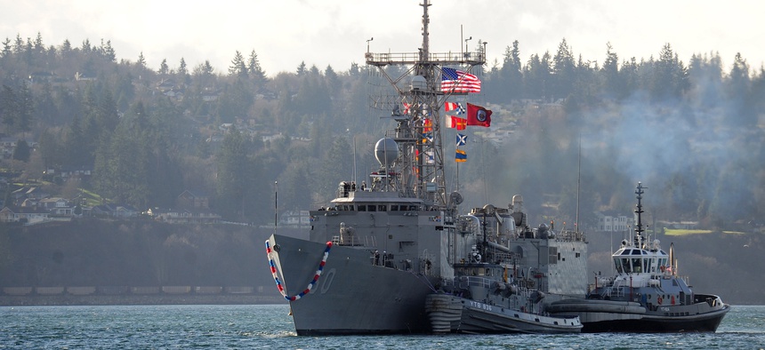 The Oliver Hazard Perry-class frigate USS Rodney M. Davis (FFG 60) returns to homeport at Washington state's Naval Station Everett, Dec. 19, 2014, ahead of decommissioning in 2015.