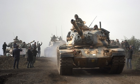 Turkish army tanks leaving Hassa, Hatay, Turkey, and heading for Afrin, an enclave in northern Syria controlled by U.S.-allied Kurdish fighters, on Jan. 22, 2018. Turkish army tanks leaving Hassa, Hatay, Turkey, and heading for Afrin, an enclave in northern Syria controlled by U.S.-allied Kurdish fighters, on Jan. 22, 2018.