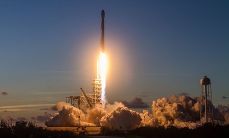 A SpaceX Falcon 9 rocket launchs the Echostar 105/SES-11 communications satellite from NASA’s Kennedy Space Center. A SpaceX Falcon 9 rocket launchs the Echostar 105/SES-11 communications satellite from NASA’s Kennedy Space Center.