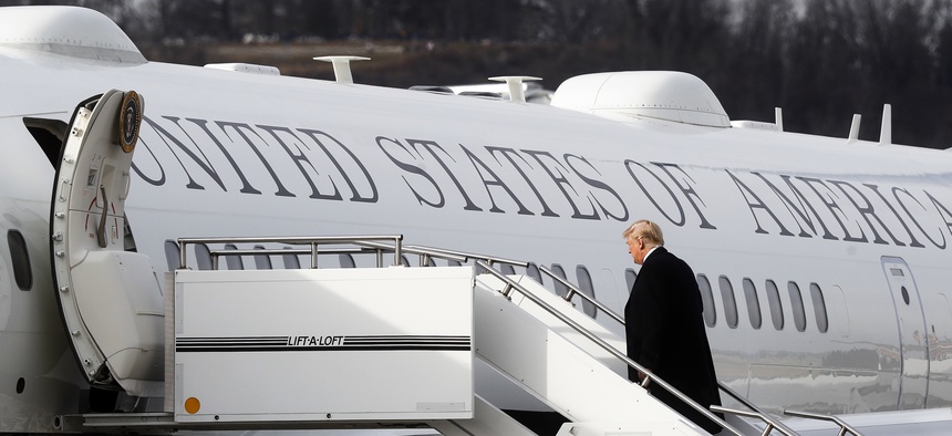 President Donald Trump boards Air Force One before leaving Cincinnati Municipal Lunken Airport, Feb. 5, 2018, in Cincinnati.