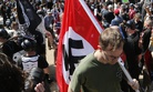 An Aug. 12, 2017, image shows a white supremacist carrying a NAZI flag into the entrance to Emancipation Park in Charlottesville, Va. 
