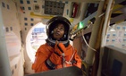 NASA astronaut Stephanie Wilson is attired in a training version of her shuttle launch and entry suit in a 2009 training mission. NASA astronaut Stephanie Wilson is attired in a training version of her shuttle launch and entry suit in a 2009 training mission.