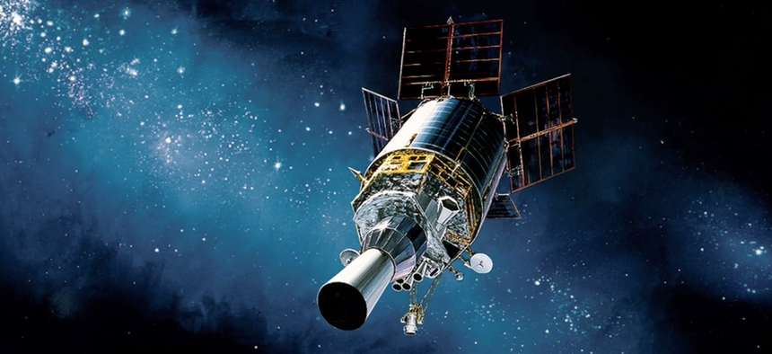 Air Force Space Command-operated Defense Support Program (DSP) satellite is illustrated in orbit. In their 22,300-mile, geosynchronous orbits, DSP satellites help protect the U.S. and allies by detecting missile launches and nuclear detonations.