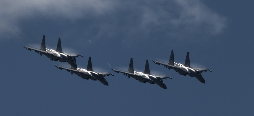 Russian Su-35s are reported being equipped with an AI-driven targeting device. Here, Su-35s perform at an air show outside Moscow in July 2017.