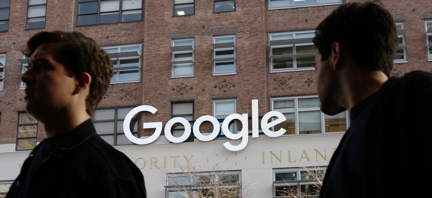 eople walk by Google offices, Monday, Dec. 4, 2017, in New York.
