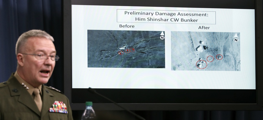 Marine Lt. Gen. Kenneth F. McKenzie Jr., director, Joint Staff, speaks as he shows photographs from before and after the U.S.-led airstrikes against Syria during a media availability at the Pentagon on April 14, 2018.