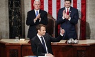 French President Emmanuel Macron spoke to a joint meeting of Congress in Washington, Wed., April 25, 2018. Behind him is Vice Pres. Mike Pence and House Speaker Paul Ryan, R-Wisc.