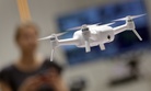 Melanie Richter controls the Yuneec selfie drone 'Breeze 4K' with a smartphone at the IFA 2017 tech fair in Berlin, Germany, Thursday, Aug. 31, 2017