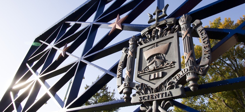 The USNA coat-of-arms on the entrance gates to the US Naval Academy in downtown Annapolis on October 21, 2012 in Annapolis, Maryland.