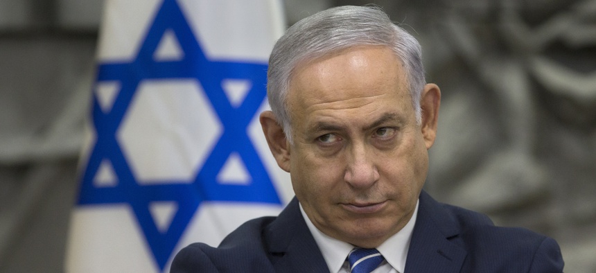 Israeli Prime Minister Benjamin Netanyahu attends a special cabinet meeting in the southern Israeli city of Dimona, March 20, 2018.