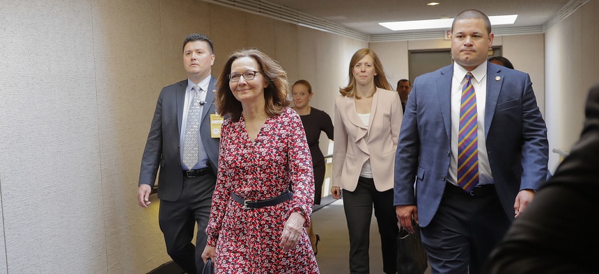 CIA Director Nominee Gina Haspel walks to a holding room before heading to her next meeting, on Capitol Hill in Washington, Monday, May 7, 2018. Haspel was meeting with senators today whose support could be key to her confirmation.