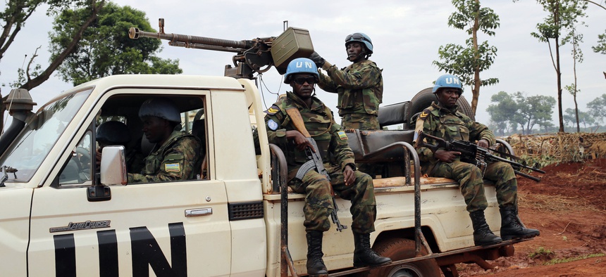 In this photo taken Friday May 26, 2017, UN peacekeepers patrol outside Bria, Central African Republic.