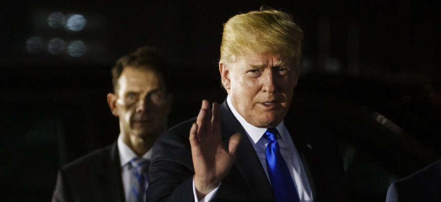 In this Sunday, June 10, 2018, file photo, U.S. President Donald Trump arrives at Paya Lebar Air Base for a summit with North Korean leader Kim Jong Un.