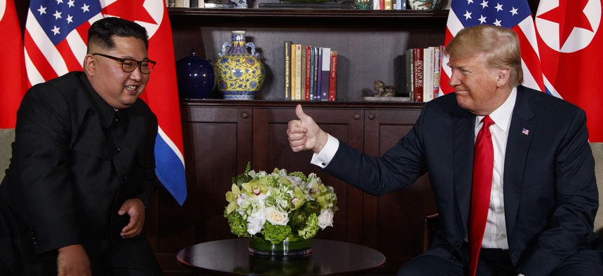 President Donald Trump meets with North Korean leader Kim Jong Un on Sentosa Island, Tuesday, June 12, 2018, in Singapore.