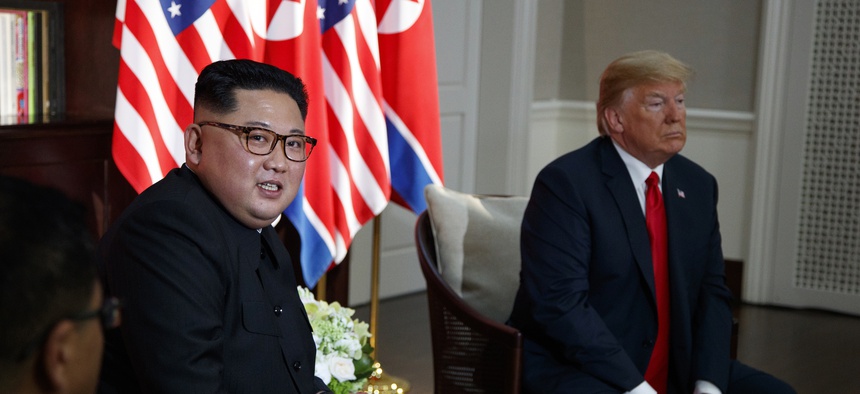 President Donald Trump meets with North Korean leader Kim Jong Un on Sentosa Island, Tuesday, June 12, 2018, in Singapore.