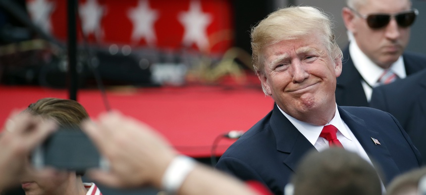 President Donald Trump greets military families on the South Lawn of the White House, Wed., July 4, 2018, in Washington.