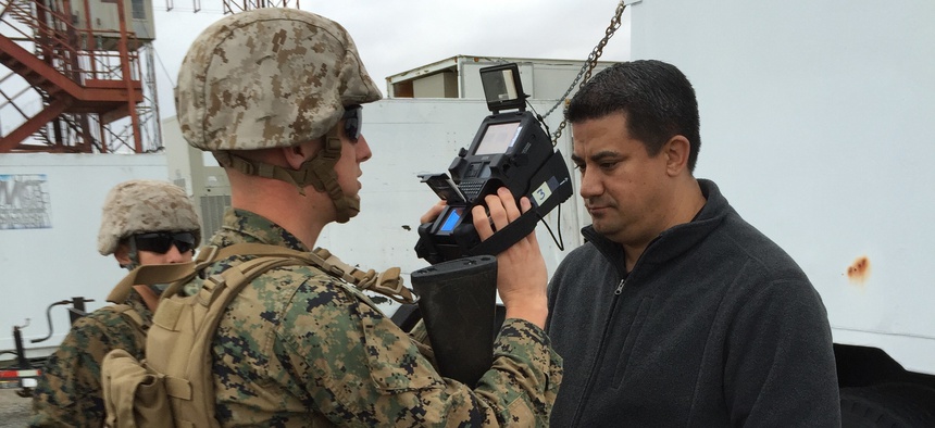 Marines conduct a field user evaluation for the Identity Dominance System-Marine Corps, or IDS-MC, in Dahlgren, Virginia. In September, Marine Corps Systems Command completed fielding of the IDS-MC, which is a new biometrics system .